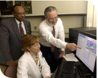 FItz Walker (Bartron Medical Imaging) and Drs. Jennifer Diederich and Alan Lurie (School of Dental Medicine, Univ. of Conn) view dental x-ray images with the Med-Seg viewer.